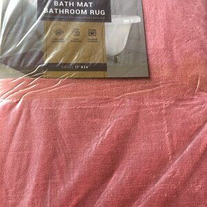 2 coral peach colored 17x24 bath mats. Matching Set - So Pretty